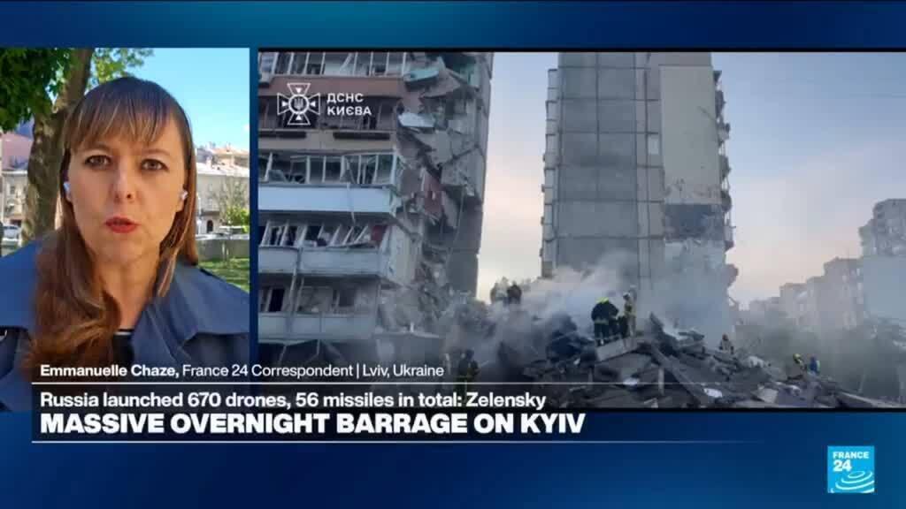 A massive overnight barrage on Kyiv splits a residential building in two